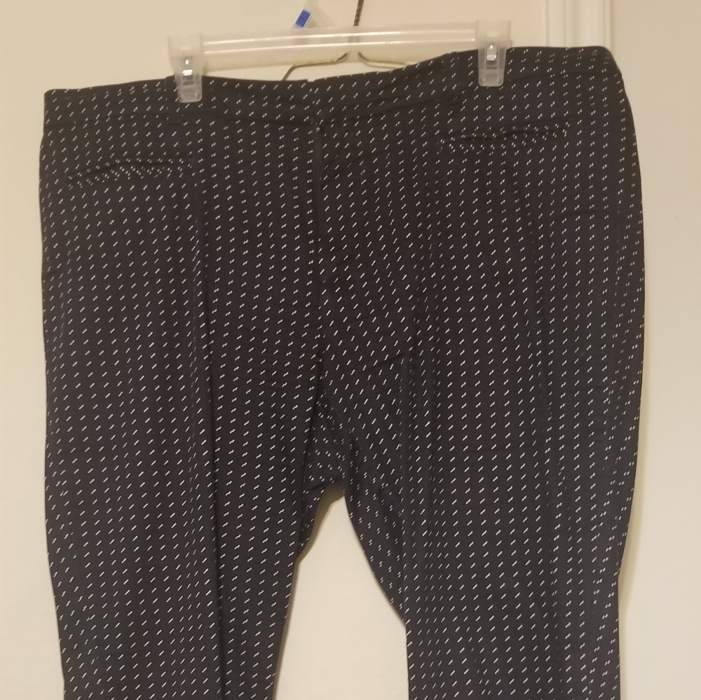 Navy blue ankle length slacks with white dots